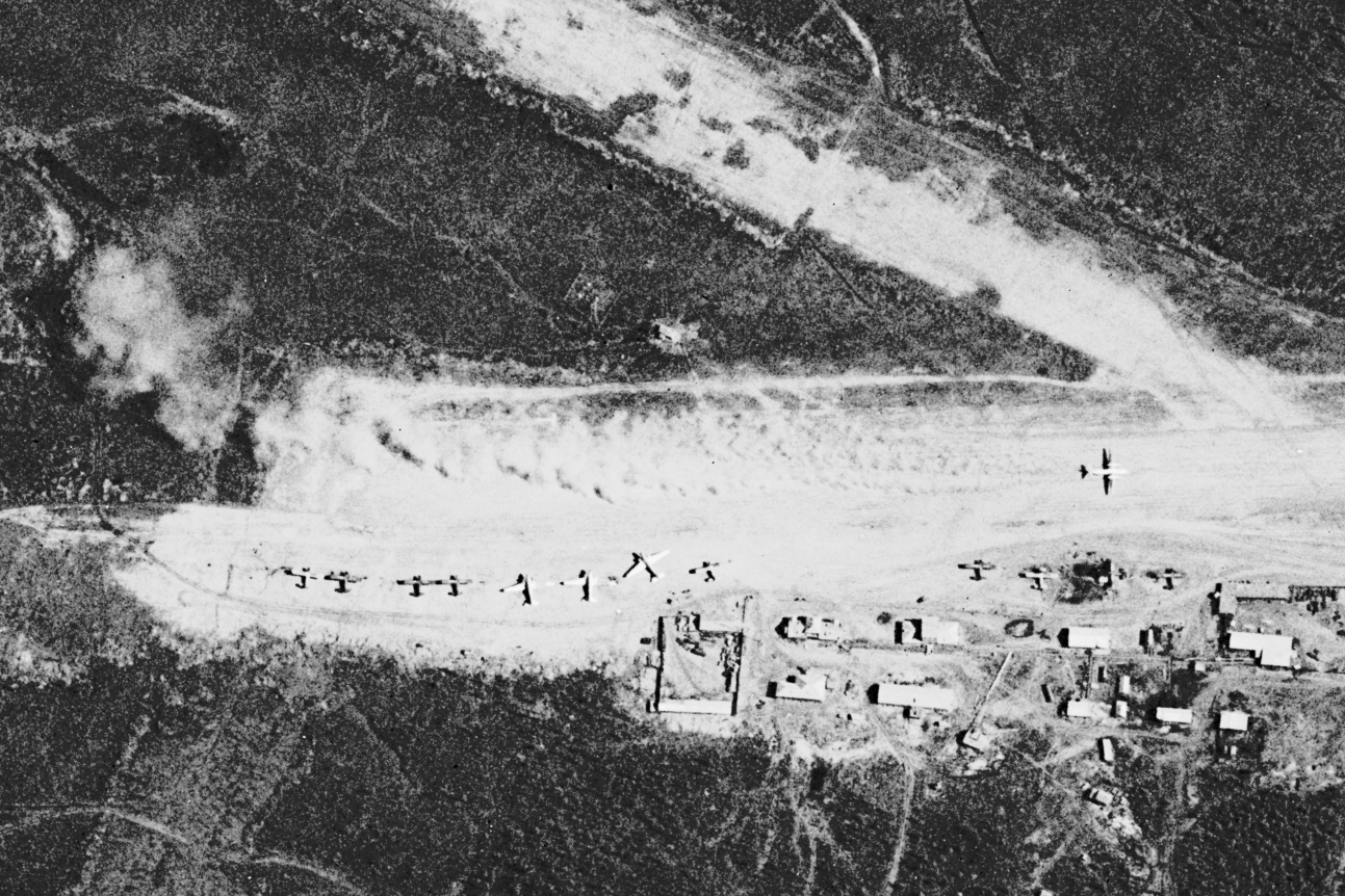 A plane taking off from a dirt runway in Zhigansk, Russia, captured by a KH-7 GAMBIT spy satellite on June 9, 1966, 